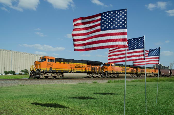 BNSF 3972, a Tier 4 ET44C4 locomotive, hauls grain in Saginaw, Texas. BNSF 3972, a Tier 4 ET44C4 locomotive, hauls grain in Saginaw, Texas.